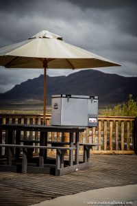 camping fridge kept in the shade